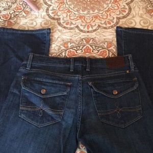 Sized 2/26 cate boot dark washed blue jeans